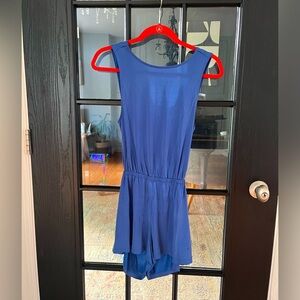 Silent + Noise Blue short Jumper with open back. Size Small.